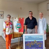 Il pittore trecatese Minera ha donato un quadro alla biblioteca civica