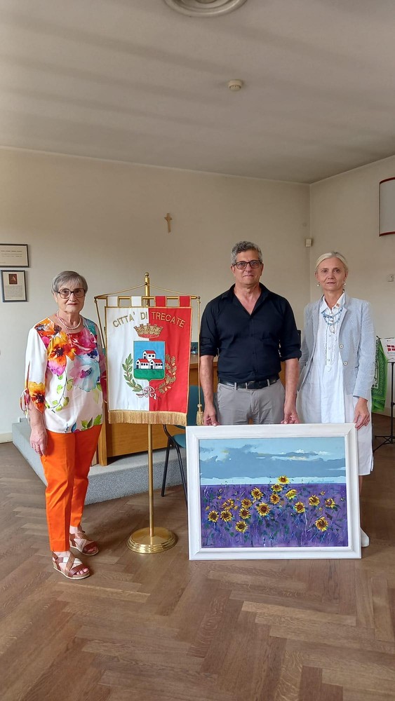 Il pittore trecatese Minera ha donato un quadro alla biblioteca civica
